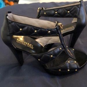 Michael Kors black and gold spiked heels